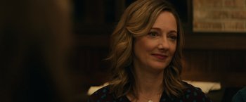 Movie still from “Halloween” (2018), directed by David Gordon Green – A person with long hair; Close Up shot, Over the shoulder angle