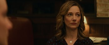 Movie still from “Halloween” (2018), directed by David Gordon Green – A person looking at the camera; Close Up shot, Over the shoulder angle