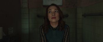 Movie still from “Halloween” (2018), directed by David Gordon Green – A woman is looking up at the ceiling; Medium shot, Low angle