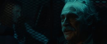 Movie still from “Halloween” (2018), directed by David Gordon Green – An old man with a mustache and a mustache comb; Close Up shot, Over the shoulder angle