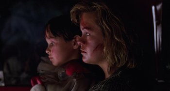 Movie still from “Halloween 4: The Return of Michael Myers” (1988), directed by Dwight H. Little – Two young boys with fake blood on their faces; Close Up shot, Low angle