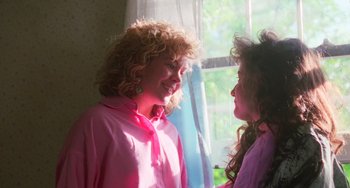 Movie still from “Halloween 5: The Revenge of Michael Myers” (1989), directed by Dominique Othenin-Girard – Two women standing next to each other in front of a window; Close Up shot, Over the shoulder angle