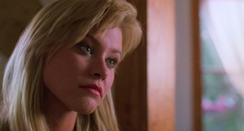 Movie still from “Halloween 5: The Revenge of Michael Myers” (1989), directed by Dominique Othenin-Girard – A person with blonde hair and green eyes; Close Up shot, Low angle