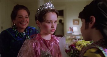 Movie still from “Halloween 5: The Revenge of Michael Myers” (1989), directed by Dominique Othenin-Girard – A young girl in a pink dress and a tiara; Close Up shot, Over the shoulder angle