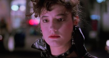 Movie still from “Halloween 5: The Revenge of Michael Myers” (1989), directed by Dominique Othenin-Girard – A person wearing a leather jacket; Close Up shot, Low angle