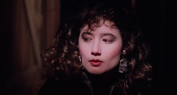 Movie still from “Halloween 5: The Revenge of Michael Myers” (1989), directed by Dominique Othenin-Girard – A person with curly hair; Close Up shot, Over the shoulder angle