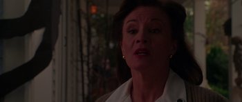 Movie still from “Halloween H20: 20 Years Later” (1998), directed by Steve Miner – An older woman is looking into the camera; Close Up shot, Low angle