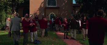 Movie still from “Halloween H20: 20 Years Later” (1998), directed by Steve Miner – A group of people standing outside of a building; Wide shot, High angle