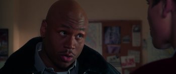 Movie still from “Halloween H20: 20 Years Later” (1998), directed by Steve Miner – A person wearing a black jacket; Close Up shot, High angle