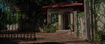 Movie still from “Halloween H20: 20 Years Later” (1998), directed by Steve Miner – A house that is in the middle of the day; Extreme Wide shot, Low angle