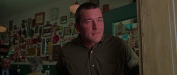 Movie still from “Halloween H20: 20 Years Later” (1998), directed by Steve Miner – A person wearing a brown shirt; Close Up shot, Over the shoulder angle