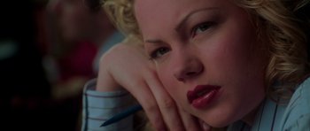 Movie still from “Halloween H20: 20 Years Later” (1998), directed by Steve Miner – A person holding a pencil; Close Up shot, High angle