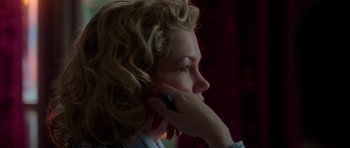 Movie still from “Halloween H20: 20 Years Later” (1998), directed by Steve Miner – A young woman talking on a cell phone while holding her hand to her ear; Close Up shot, Low angle