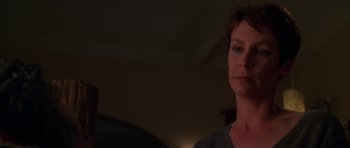 Movie still from “Halloween H20: 20 Years Later” (1998), directed by Steve Miner – A person in a dark room; Close Up shot, Low angle