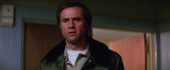 Movie still from “Halloween II” (1981), directed by Rick Rosenthal – A person wearing a jacket; Close Up shot, Low angle