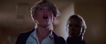 Movie still from “Halloween II” (1981), directed by Rick Rosenthal – A person with a surprised look on their face; Close Up shot, Low angle