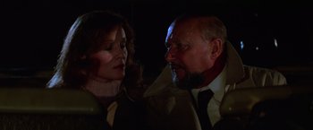 Movie still from “Halloween II” (1981), directed by Rick Rosenthal – A man and a woman are looking at each other; Close Up shot, Over the shoulder angle