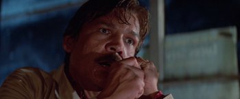 Movie still from “Halloween III: Season of the Witch” (1982), directed by Tommy Lee Wallace – A person brushing his teeth; Close Up shot, Low angle