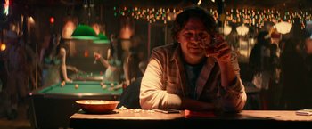 Movie still from “Halloween Kills” (2021), directed by David Gordon Green – A man sitting at a table in a restaurant; Medium shot, Over the shoulder angle