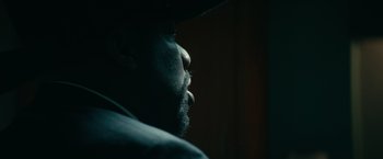 Movie still from “Halloween Kills” (2021), directed by David Gordon Green – A person wearing a hat; Extreme Close Up shot, Low angle