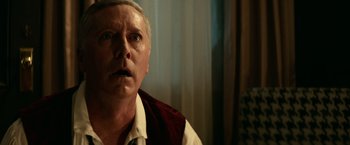 Movie still from “Halloween Kills” (2021), directed by David Gordon Green – An older man with a surprised look on his face; Close Up shot, Low angle