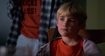 Movie still from “Halloween: The Curse of Michael Myers” (1995), directed by Joe Chappelle – A young boy sitting in front of a window; Close Up shot, Low angle