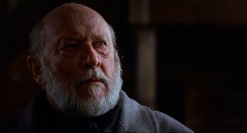 Movie still from “Halloween: The Curse of Michael Myers” (1995), directed by Joe Chappelle – An old man with a beard and a mustache; Close Up shot, Low angle