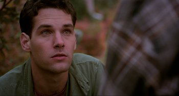 Movie still from “Halloween: The Curse of Michael Myers” (1995), directed by Joe Chappelle – A person sitting down; Close Up shot, Over the shoulder angle