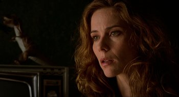 Movie still from “Halloween: The Curse of Michael Myers” (1995), directed by Joe Chappelle – A person with curly hair; Close Up shot, Low angle