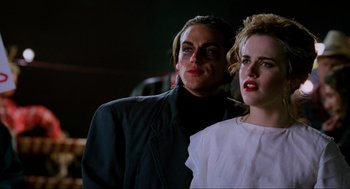 Movie still from “Halloween: The Curse of Michael Myers” (1995), directed by Joe Chappelle – Two women standing next to each other in a dark room; Close Up shot, Low angle