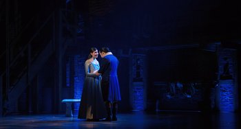 Movie still from “Hamilton” (2020), directed by Thomas Kail – A man and a woman standing next to each other on a stage; Wide shot, Over the shoulder angle