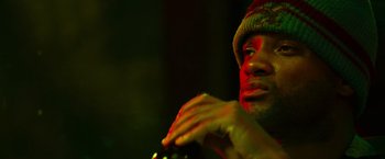 Movie still from “Hancock” (2008), directed by Peter Berg – A person wearing a hat; Close Up shot, Low angle