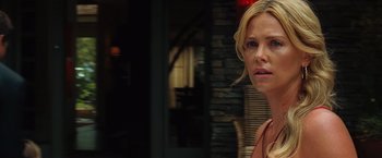 Movie still from “Hancock” (2008), directed by Peter Berg – A person wearing a jacket; Close Up shot, Over the shoulder angle