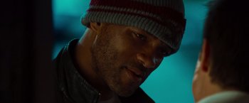 Movie still from “Hancock” (2008), directed by Peter Berg – A person wearing a hat; Close Up shot, Low angle