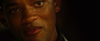 Movie still from “Hancock” (2008), directed by Peter Berg – A person's eyes and face; Extreme Close Up shot, Over the shoulder angle