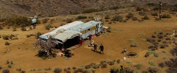 Movie still from “Hancock” (2008), directed by Peter Berg – An aerial view of an rv in the middle of nowhere; Extreme Wide shot, High angle