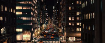 Movie still from “Hancock” (2008), directed by Peter Berg – An aerial view of a busy city street at night; Extreme Wide shot, High angle