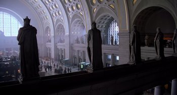 Movie still from “Hannibal” (2001), directed by Ridley Scott – A statue of a person in a large building; Extreme Wide shot, High angle