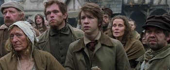 Movie still from “Hansel & Gretel: Witch Hunters” (2013), directed by Tommy Wirkola – A group of people standing next to each other; Close Up shot, Low angle