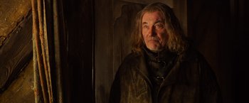 Movie still from “Hansel & Gretel: Witch Hunters” (2013), directed by Tommy Wirkola – An older man with long hair and a beard; Close Up shot, Low angle