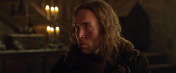 Movie still from “Hansel & Gretel: Witch Hunters” (2013), directed by Tommy Wirkola – A person with long brown hair; Close Up shot, Low angle