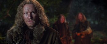 Movie still from “Hansel & Gretel: Witch Hunters” (2013), directed by Tommy Wirkola – A person wearing a coat; Close Up shot, Low angle