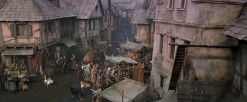 Movie still from “Hansel & Gretel: Witch Hunters” (2013), directed by Tommy Wirkola – An overhead view of a medieval market scene; Wide shot, High angle