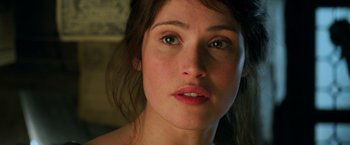 Movie still from “Hansel & Gretel: Witch Hunters” (2013), directed by Tommy Wirkola – A woman's face with green eyes; Close Up shot, Over the shoulder angle