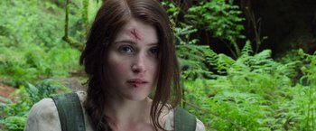 Movie still from “Hansel & Gretel: Witch Hunters” (2013), directed by Tommy Wirkola – A woman with a scar on her face and neck; Close Up shot, Low angle