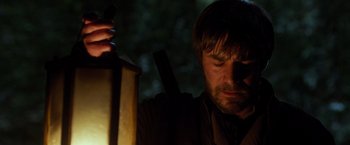 Movie still from “Hansel & Gretel: Witch Hunters” (2013), directed by Tommy Wirkola – A person holding a lamp; Close Up shot, Low angle