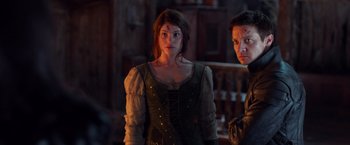 Movie still from “Hansel & Gretel: Witch Hunters” (2013), directed by Tommy Wirkola – A woman and a man standing next to each other; Medium shot, Over the shoulder angle
