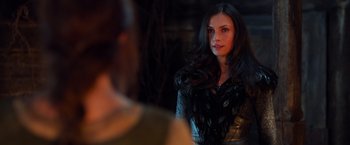 Movie still from “Hansel & Gretel: Witch Hunters” (2013), directed by Tommy Wirkola – A beautiful young woman standing in front of a mirror; Close Up shot, Over the shoulder angle