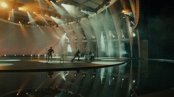 Movie still from “Happier Than Ever: A Love Letter to Los Angeles” (2021), directed by Patrick Osborne – A group of people standing on top of a stage; Extreme Wide shot, High angle