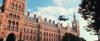 Movie still from “Harry Potter and the Chamber of Secrets” (2002), directed by Chris Columbus – A car flying in the air over a building; Extreme Wide shot, Low angle
